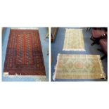A pair of Persian design rugs in Messina green, approximately 68cm x 120cm, together with another