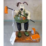 A Coalport figure of Gromit from "The Wrong Trousers"
