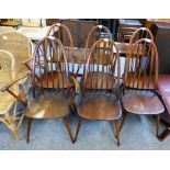 A set of two carving and four single Ercol stick back dining chairs