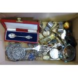 A box of collectables including silver spoon, caddy spoon, silver pocket watch, bangle, whistles,