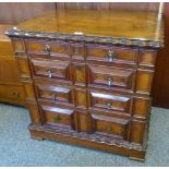 A 19th century continental walnut chest of four long drawers with moulded panelled fronts, 81cm