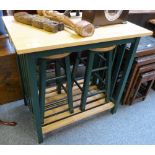A modern kitchen bar table with polished hardwood top and green painted base incorporating a pair of