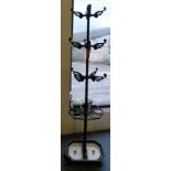 A Victorian cast-iron hallstand, the central column with three tiers of coat hooks over eight