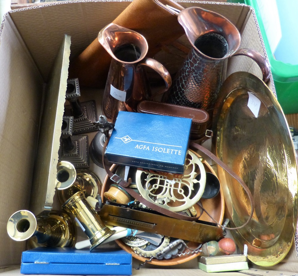 A box of metal ware including plated candlesticks, brass candlesticks, copper jugs, brass plates,