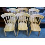 A near set of six Victorian style beech spindle back kitchen chairs