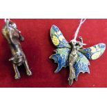 An enamelled brooch in the form of a butterfly with a central figure of a female together with