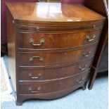 A reproduction Georgian style cross-banded mahogany bow-fronted bachelor's chest of four drawers