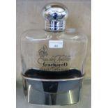 A French 1980's Cacharel eau de toilette bottle in the shape of a hip flask, 30cm tall