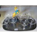 Seven Babycham glasses on plated tray together with a Bambi