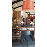 A wooden table lamp 1960s/ 70s together with a wrought iron standard lamp (2)