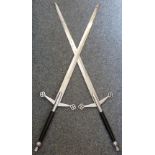 A pair of ornamental Scottish broad swords