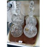 Six cut glass decanters including two pairs