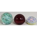 Two Whitefriars paperweights, one with swirling opaque white and turquoise inclusion and bubbles,
