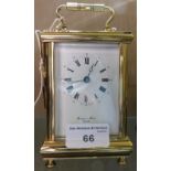 A brass carriage clock, the dial inscribed Bornand Freres Bicester