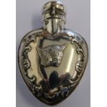 A Victorian silver heart shaped scent bottle by William Comyns London 1896, the front with an