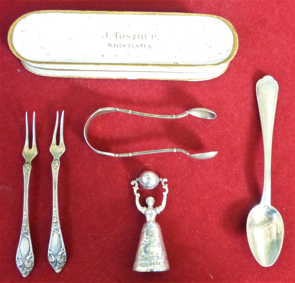 A Dutch silver wager cup, London import 1903, a Danish silver tea spoon by J. Tostrup, two pickle