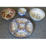 A Chinese supper dish on rotating base together with an Imari bowl, two other Chinese bowls (4)