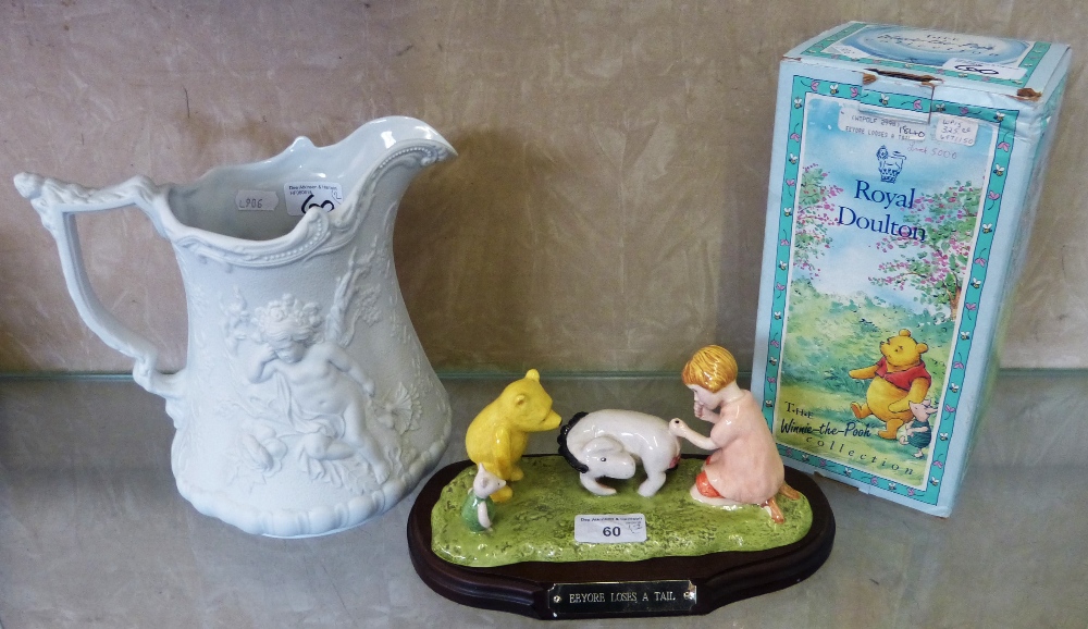 Boxed Royal Doulton Winnie the Pooh collection group "Eyeore Loses a Tail" together with a