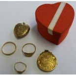 Three gold rings 5.5gms and two gold front and back lockets