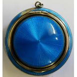 A silver and blue guilloche enamel powder compact