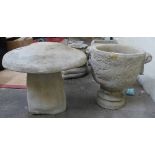 A composition staddle stone together with circular composition twin handled urn (2)