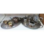 A Victorian five piece plated tea and coffee service together with another later plated tea