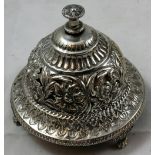 A Victorian silver table bell, by S.W. Smith & Co., Birmingham 1889, of domed form with embossed and