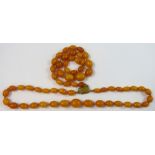 A two row graduated amber bead necklace, weight 57 grams, untested and unwarranted.