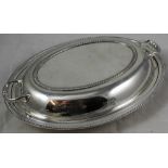 A silver entree dish, by Walker & Hall, Sheffield 1934, of oval two handled form with gadrooned