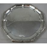 An Indian silver presentation salver, stamped SILVER, of shaped circular form with an applied Celtic