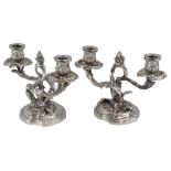 A French cast silver pair of two light candelabra, by Georges Fouquet-Lapar for Leon Lapar,