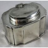 An Edwardian silver tea caddy, Birmingham 1905, of rectangular panelled form with reeded border,