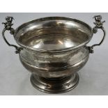 A silver two handled presentation rose bowl, Birmingham 1935, of baluster form, raised on a stem,