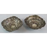 A Victorian silver pair of baskets, by Nathan & Haynes, Birmingham 1894, of square form with pierced