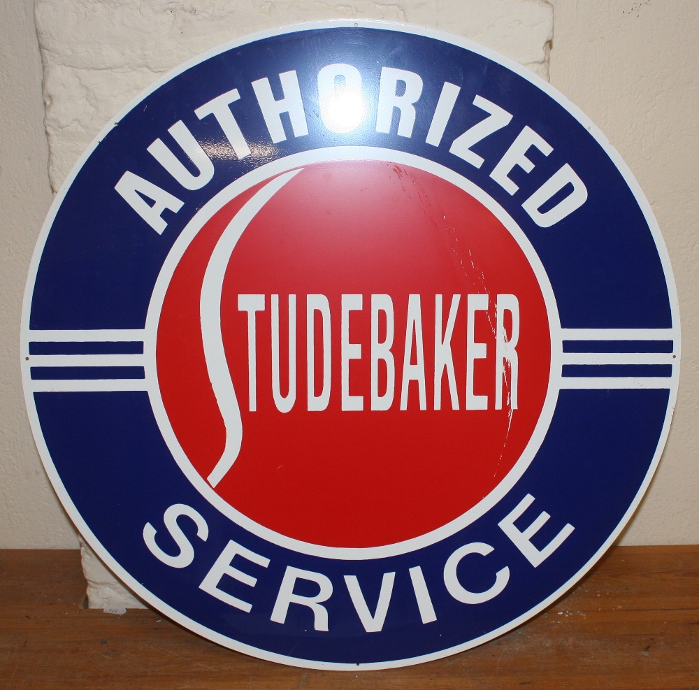 *A single sided tin and enamel Studebaker Authorized Dealer circular sign, NOS, circa 1980's,