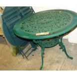 A green painted cast aluminium garden table together with a folding metal garden table and four