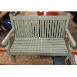 A green painted hardwood garden bench