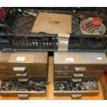 Two cabinets of nuts and bolts, a Skyes part no 336 and other tools