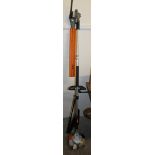 A Stihl HL100 long reach petrol hedge cutter