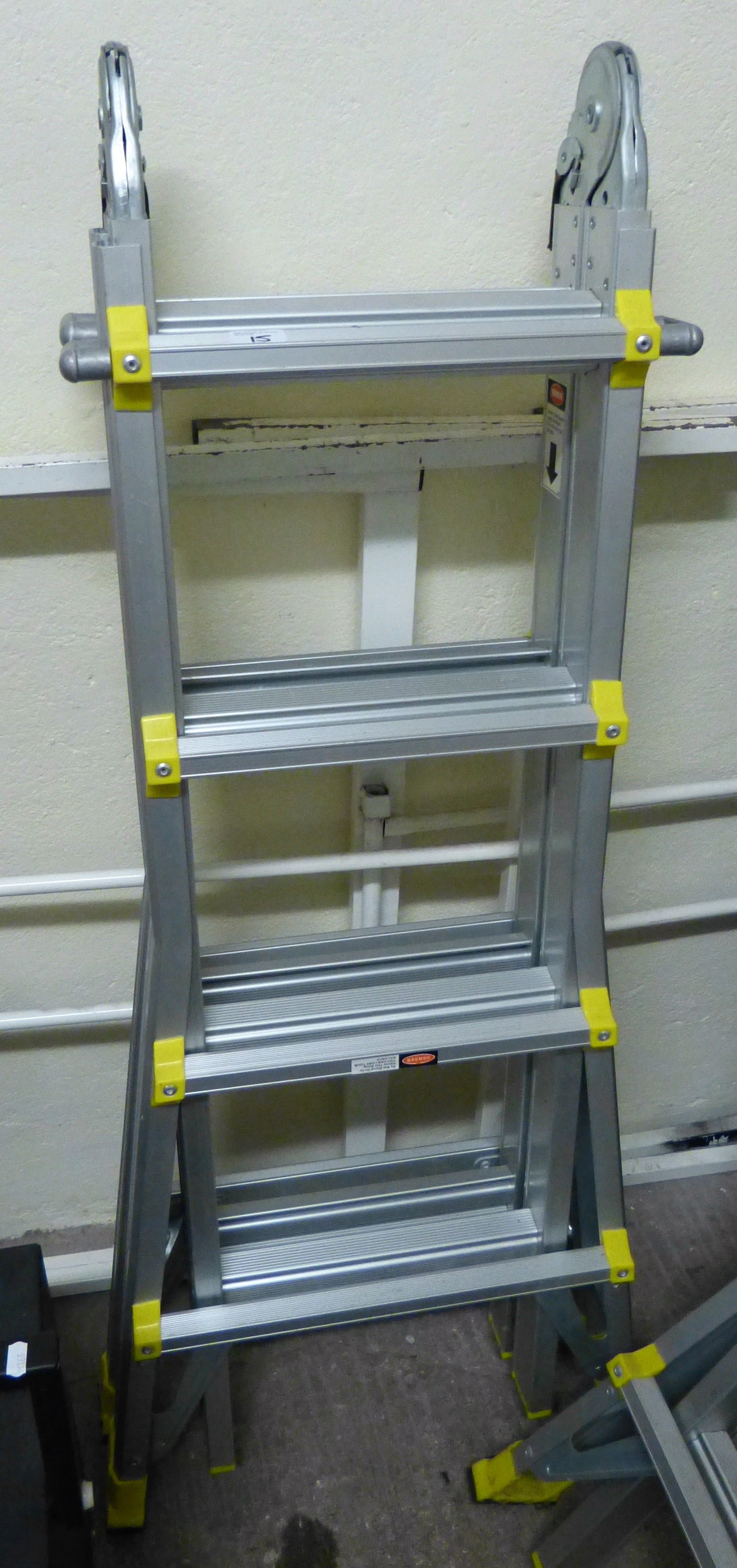 A folding aluminium ladder