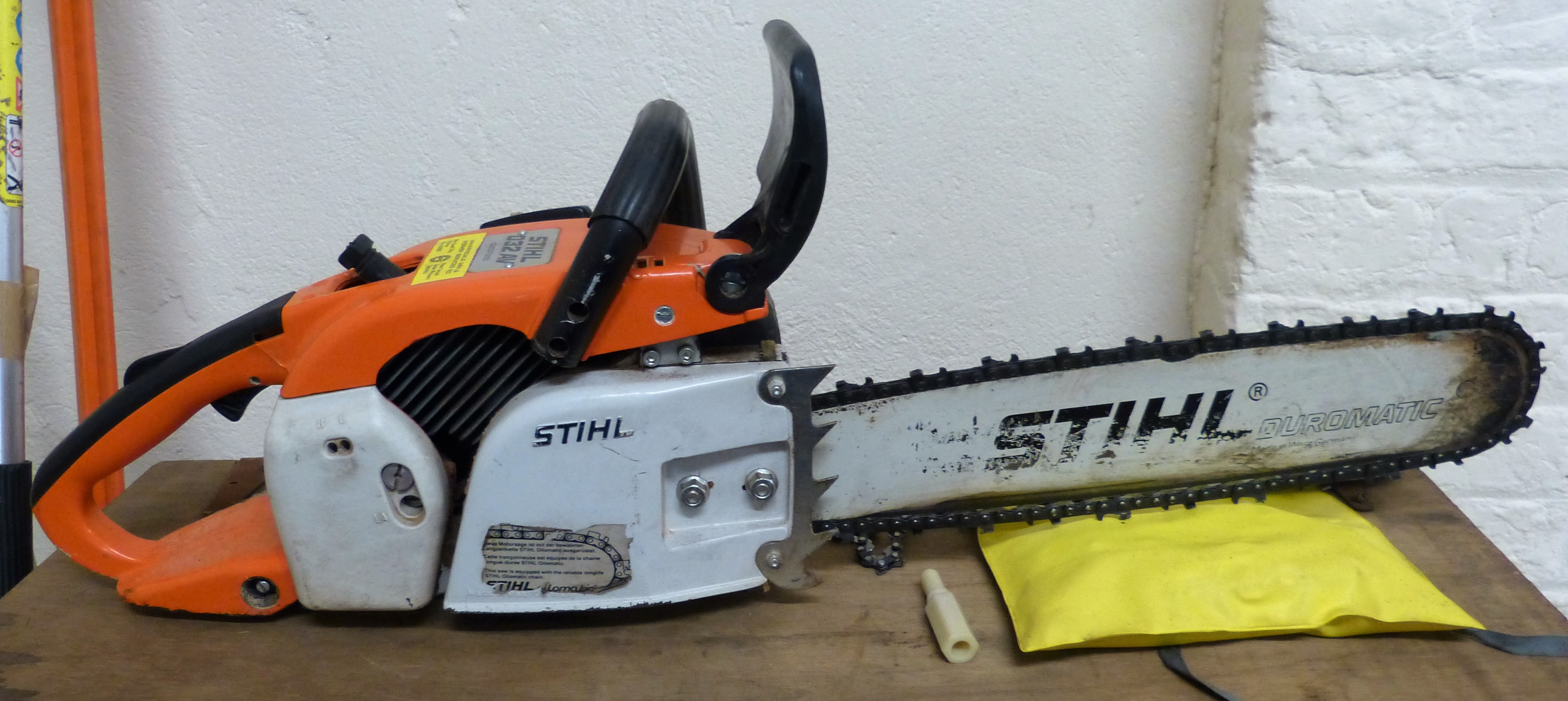 A Stihl 032 AV electronic petrol chainsaw, case