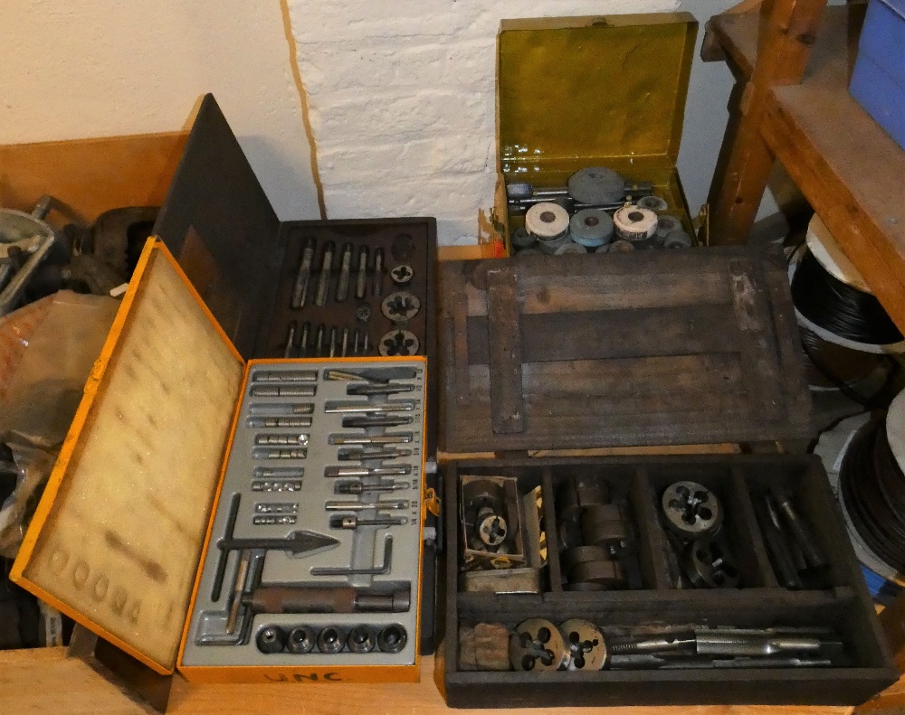 Three tap and die sets and another tool