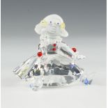 A Swarovski figure "Doll" No 626247/7550000012 designed by Gabriele Stamey, contained in a fitted