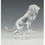 A Swarovski figure "Lion" (on a rock) NO 269377/7610000004 designed by Martin Zendron, contained