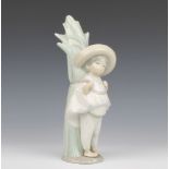 A Lladro figure of a Spanish Boy, base impressed P-2N, 29cm