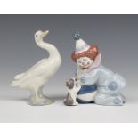 A Lladro figure of a standing goose, base impressed 0-4S 12cm together with a do. seated clown