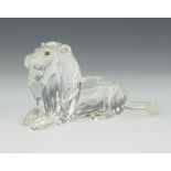 A Swarovski figure "Lion" No 185410 designed by Adi Stocker, contained in a fitted box This lot is