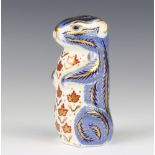 A Royal Crown Derby Imari pattern paperweight in the form of a seated squirrel with gold stopper