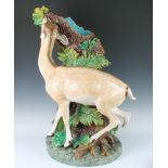 Minton Majolica modelled by Paul Comolera. A good Majolica stick stand depicting a deer standing