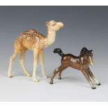 A Beswick figure Camel Foal modelled by Arthur Gredington no. 1043 12.7cm together with a Beswick